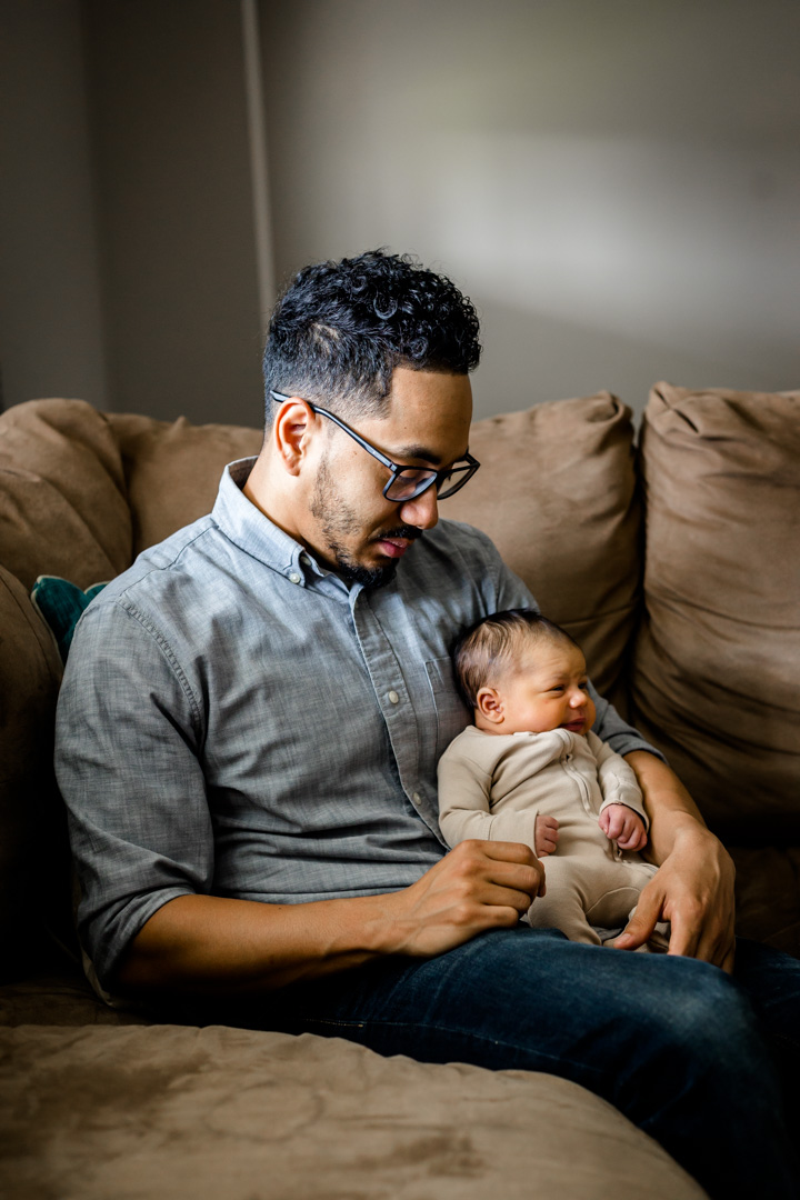 Father holding baby son